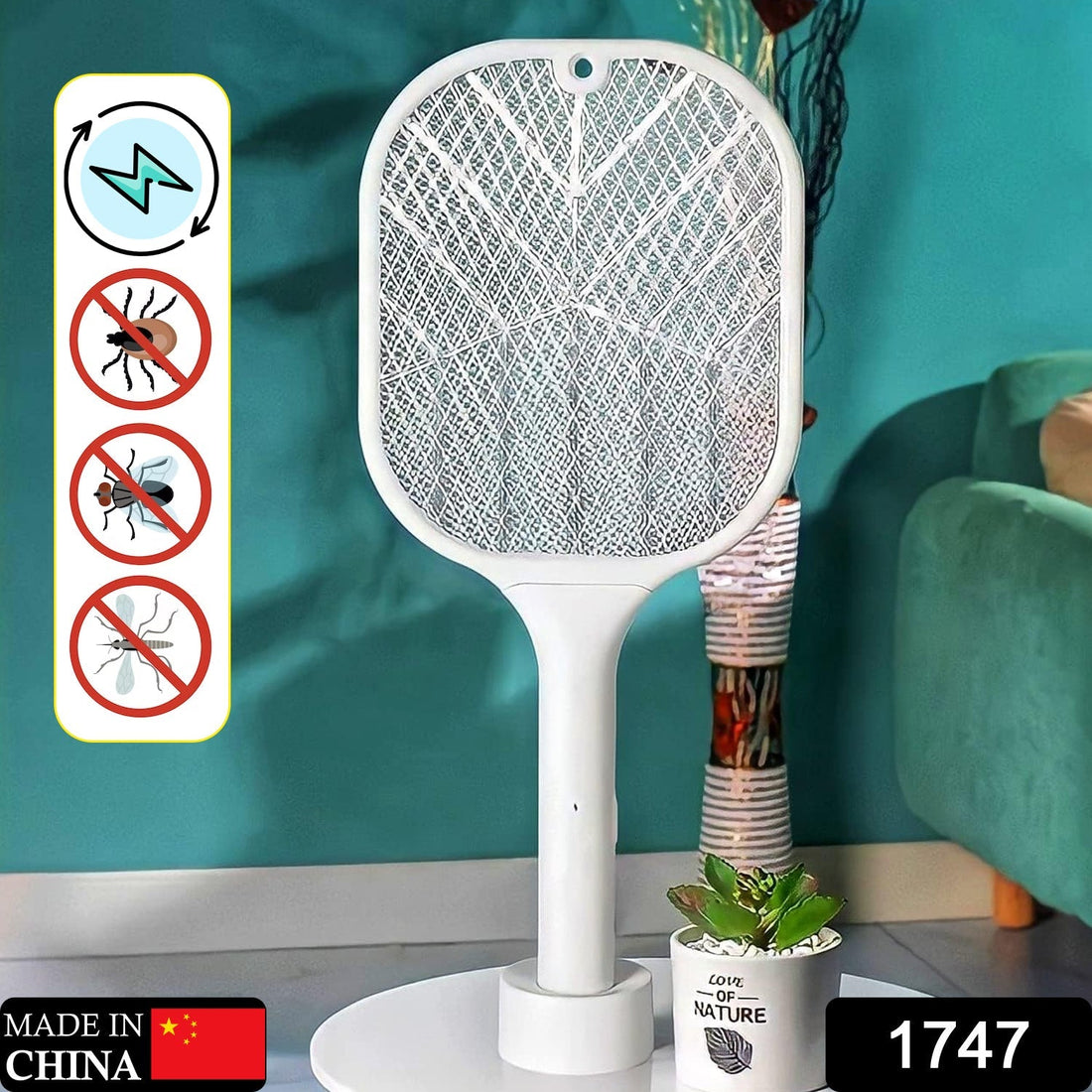 A white FlyTamer mosquito killer racket with a glowing blue UV light stands on a wooden nightstand next to a bed.