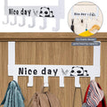 Over door hook rack holding bags and coats, demonstrating its versatility and storage capacity.