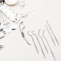 The compact AuriGlam 7-in-1 dental hygiene kit with all tools visible.