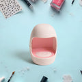 Plug-in LED nail dryer front view highlighting control button