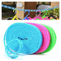 Hangers held firmly in place by the anti-slip slots on the clothesline.
