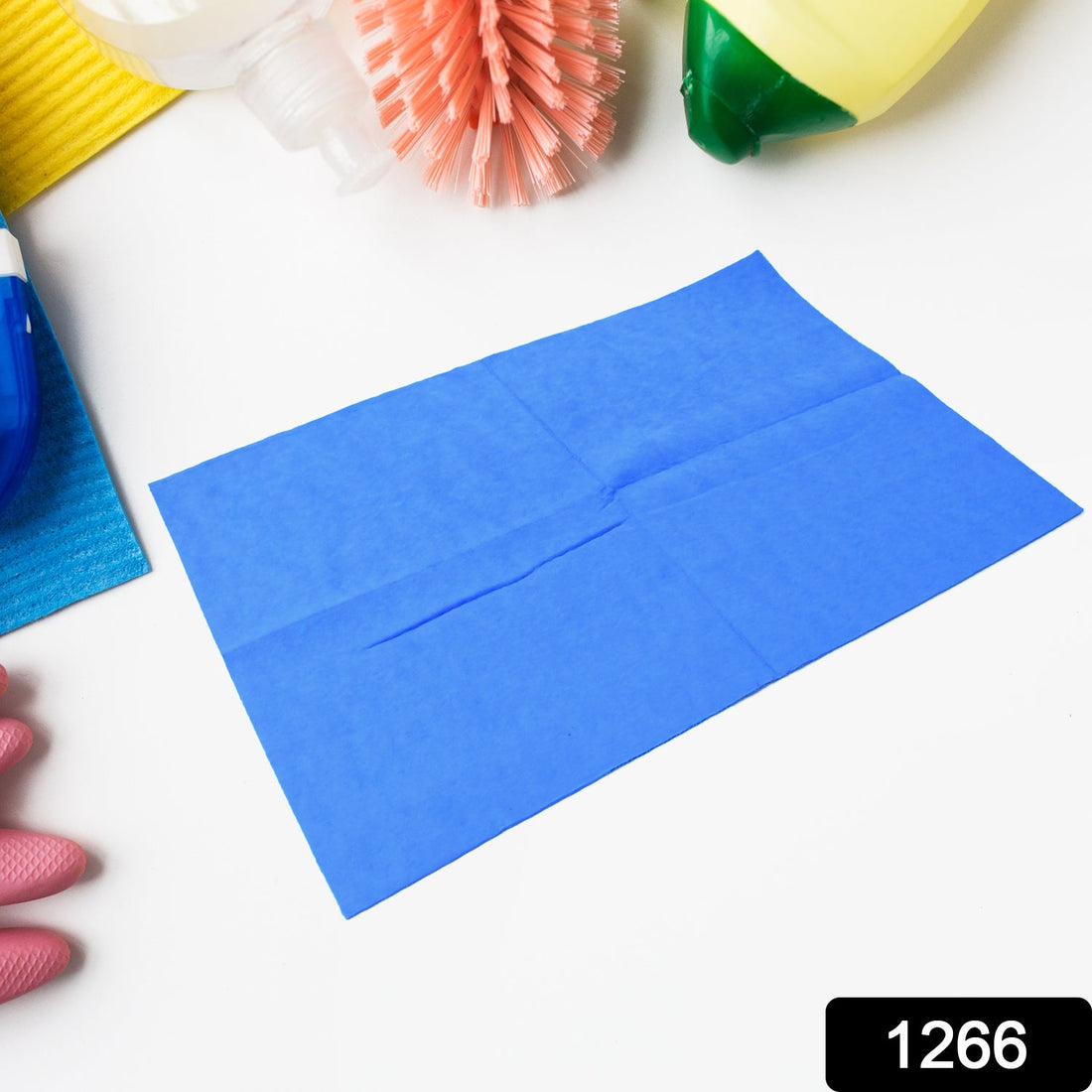 Folded Magic Cleaning Towel on a clean white surface, showcasing its texture.