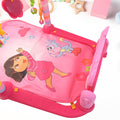 Happy baby playing on the Aditi Baby Play Gym Mat with colorful toys.