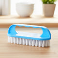 Top view of handheld cleaning brush showing durable build and sturdy bristles.