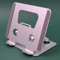 Close-up of the foldable tablet stand's sturdy base and anti-slip pads.