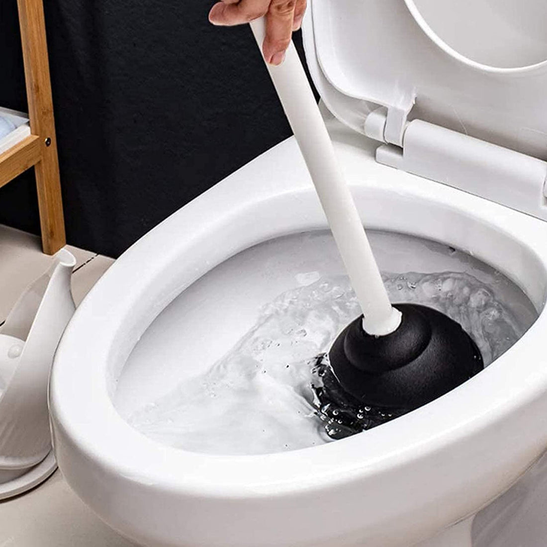 Ergonomic toilet plunger for powerful clog removal.