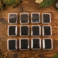 Side view of multiple compact mini jewellery storage boxes stacked