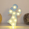 Rear view of the LED angel light, showing its battery compartment and sturdy base.