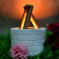 Airvanta bonfire effect diffuser creating a serene atmosphere on a wooden table.