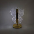 Decorative crystal table lamp emitting warm LED light