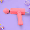 Compact view of the portable massage gun, ideal for travel and easy storage.