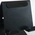 Front view of metal mobile and tablet stand showcasing compact and portable design