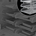 Side view of multi-layer file rack drawers stacked neatly on a shelf.