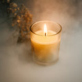 The Scented Votive Candle illuminating a cozy living space, enhancing home fragrance.