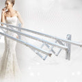 Side view of the wall-mounted foldable clothes airer, compact when not in use.