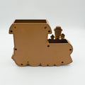 Front view of the brown plastic train key holder.