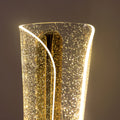 Modern tall cylindrical LED crystal table lamp on metallic base