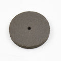 Detailed view of a single durable resin grinder cutting disc for metalwork.