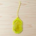Hanging citrus gel air freshener on a towel rod