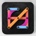 Brightly coloured alphabet numeric puzzle pieces arranged in a grid pattern.