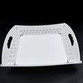 Foldable serving tray ready for use in a kitchen setting, perfect for everyday meals or outdoor gatherings.