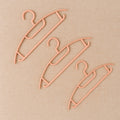 Ganesh brand plastic cloth hangers showcasing smooth edges and sturdy build