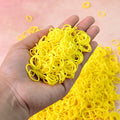 Bright orange elastic rubber bands bundled together