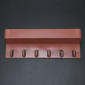 Angled view of the multi-use Key Holder Stand displaying its sleek design and ample space for organization.