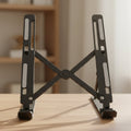 An adjustable tablet stand positioned on an office desk, promoting a comfortable and organized workspace.