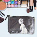 Organivo Portable Storage Bag holding small items like pens and cards.