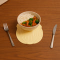 Close-up of a heat-resistant silicone leaf coaster with detailed embossed texture