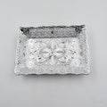 Decorative mukhwas serving tray beautifully arranged on a modern dining table.