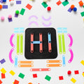 Assortment of colourful educational toy pieces for creative learning.