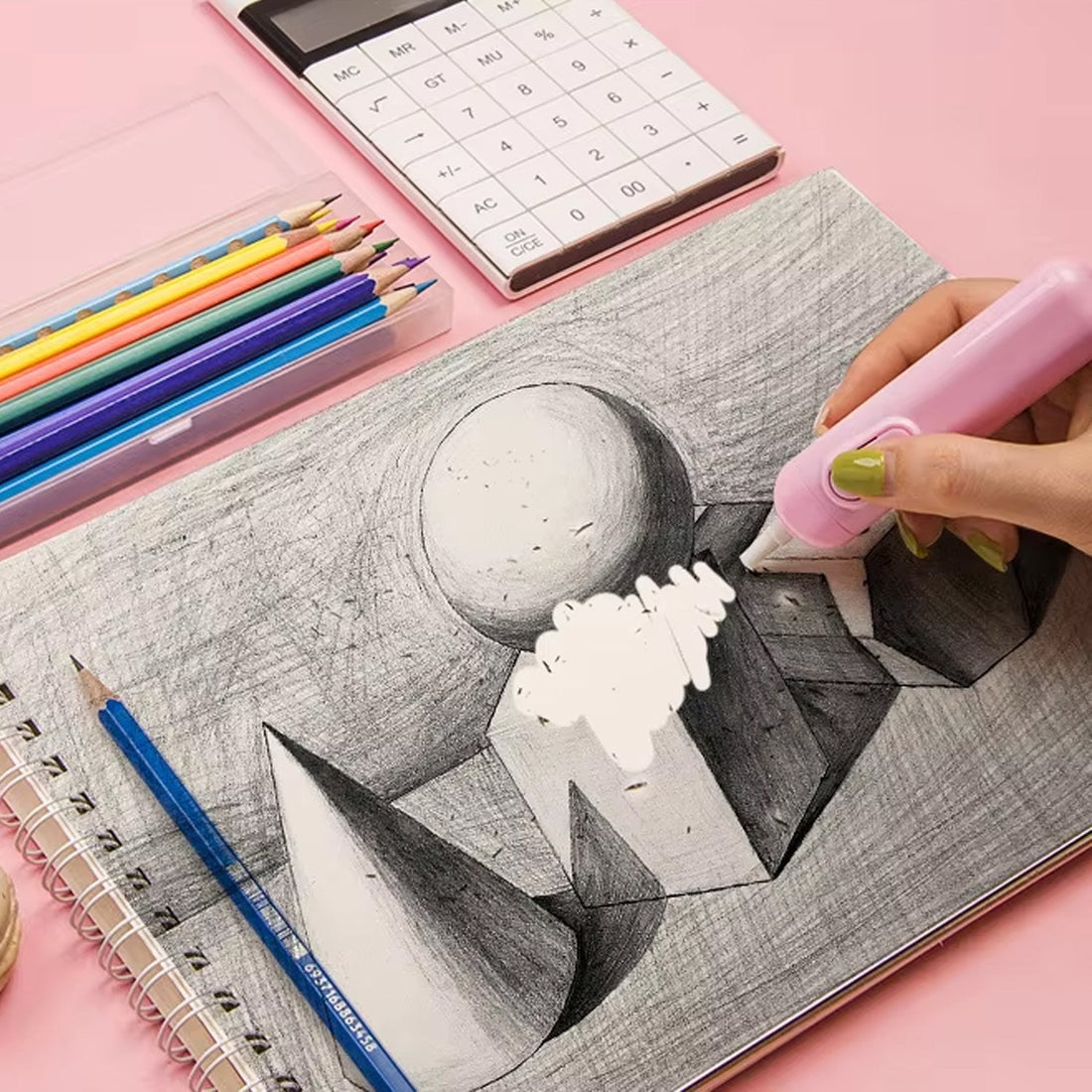 ScribbleJoy Electric Eraser Kit components, including eraser body and multiple refills, laid out.