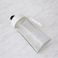 Automatic lid mechanism opening on glass oil bottle dispenser