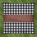 Stylish leather and cotton cushion covers adding a chic accent to a bedroom setting.