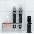 The complete soap dispensing dish brush set, showing the handle and two replacement heads.