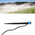Precise water stream from a Tidy Roots adjustable garden water dripper for plants.