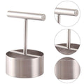 Fruit corer lying on a kitchen counter, highlighting its sleek design.