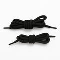 Several colourful polyester shoelaces laid out flat, highlighting the mixed color options.