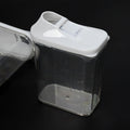 CookAura 3-piece set of transparent kitchen storage jars from an angle.