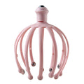 Ergonomically designed head massager for comfortable grip and use.