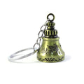 Assortment of metal temple bell keychains in various finishes, highlighting their charm.