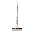 A user effortlessly cleaning a floor with the self-cleaning sponge mop, highlighting its maneuverability.