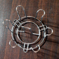 Elegant round glass stand for efficient kitchen storage.