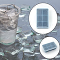 Close-up of a blue silicone ice tray showing its six individual compartments.