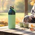 Reusable insulated water bottle suited for office and gym hydration