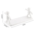 A single floating wall shelf used as a functional display area for small home accents.
