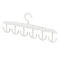 Side view of the space-saving tank top hanger with garments, showcasing its slim profile.
