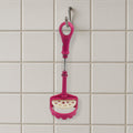 Easy-to-clean food-grade potato masher under running water.